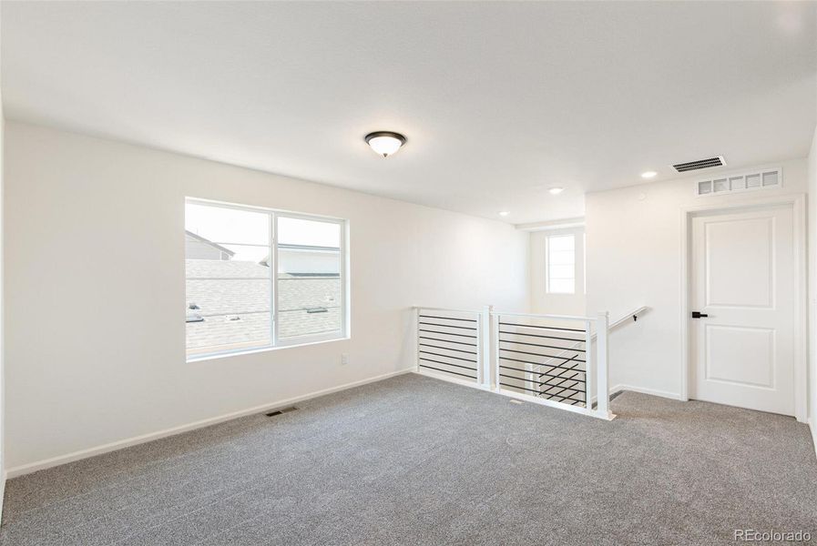 Spacious, unfurnished interior of a new home in Legato, Commerce City (Image 24).