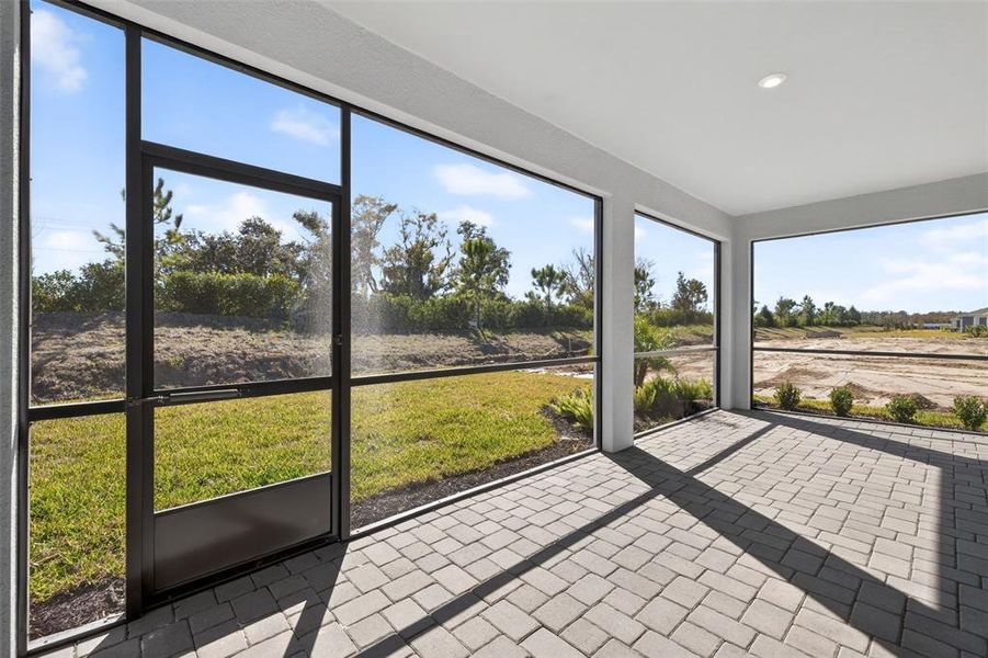 Exterior details and patio area of a home in Windwater, Parrish (Image 3).