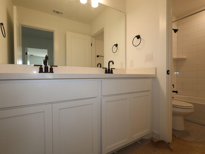 Furnished interior view inside a new home in Barksdale, Leander (Image 7). Furnished interior view inside a new home in Barksdale, Leander (Image 7).