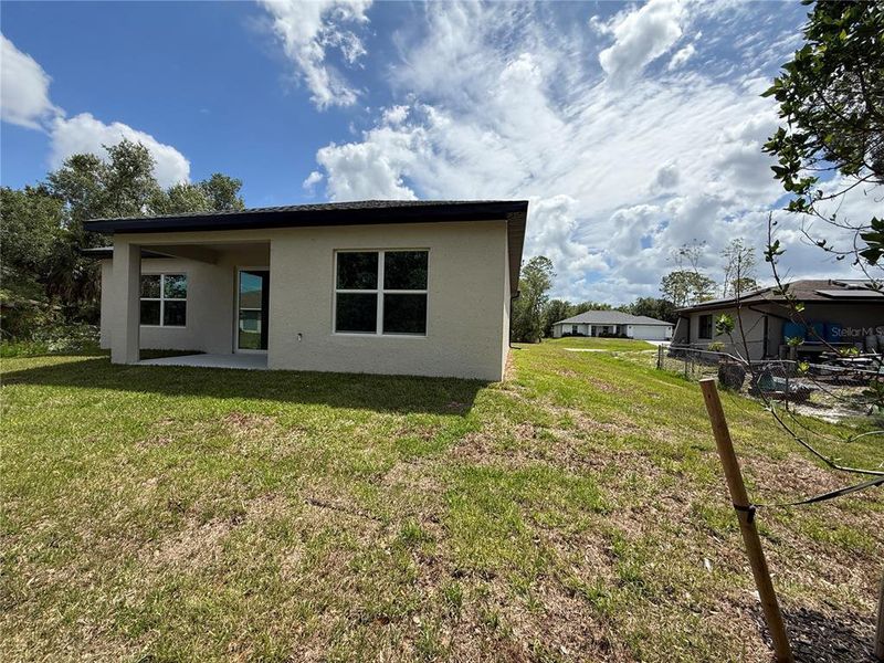 Exterior details and patio area of a home in , Port Charlotte (Image 17).