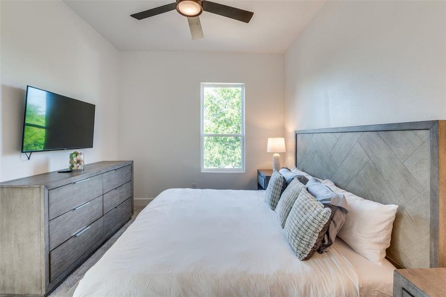 Bedroom featuring ceiling fan