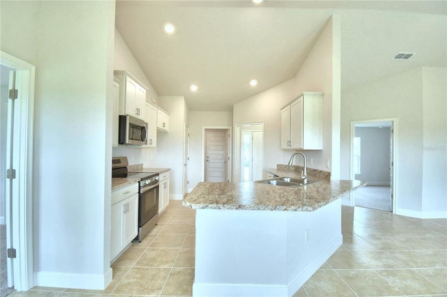 Furnished interior view inside a new home in Cadence Crossing, Auburndale (Image 17).