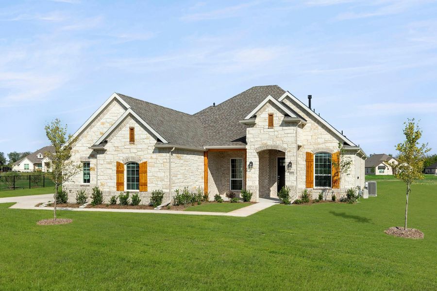 Front exterior of a new home in Ridge Park Estates, Royse City, TX, highlighting curb appeal (Image 2). Front exterior of a new home in Ridge Park Estates, Royse City, TX, highlighting curb appeal (Image 2).