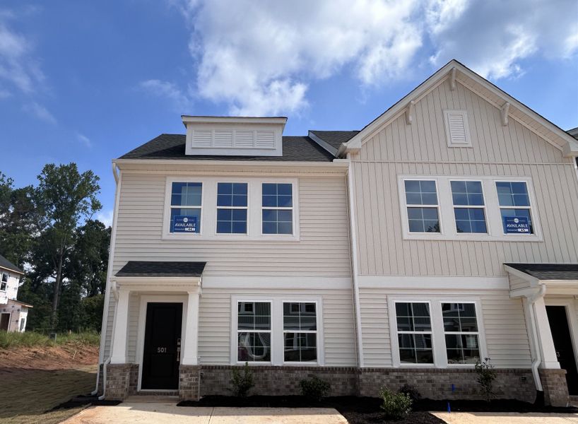 Front exterior of a new home in Edwards Station, Taylors, SC, highlighting curb appeal (Image 1). Front exterior of a new home in Edwards Station, Taylors, SC, highlighting curb appeal (Image 1).