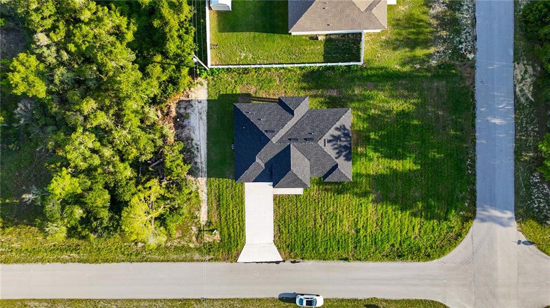 Front exterior of a new home in , Ocala, FL, highlighting curb appeal (Image 2). Front exterior of a new home in , Ocala, FL, highlighting curb appeal (Image 2).