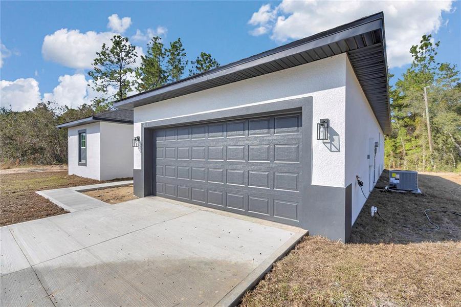Front exterior of a new home in , Ocala, FL, highlighting curb appeal (Image 20).