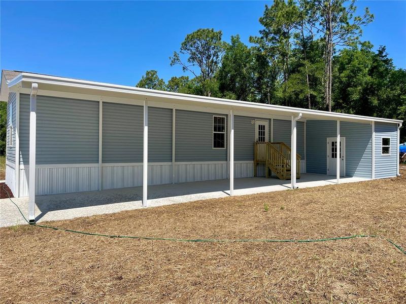 Exterior details and patio area of a home in , Ocala (Image 13).