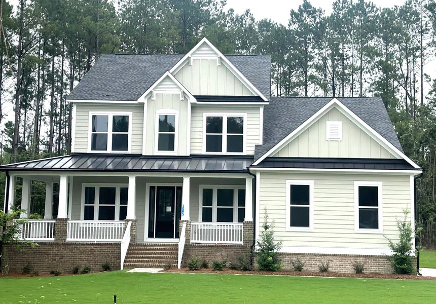 Front exterior of a new home in , Moncks Corner, SC, highlighting curb appeal (Image 2). Front exterior of a new home in , Moncks Corner, SC, highlighting curb appeal (Image 2).