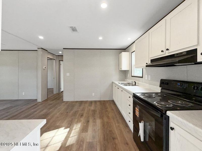 Furnished interior view inside a new home in , Lake City (Image 3).