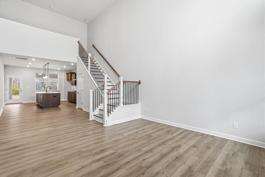 Spacious, unfurnished interior of a new home in Ovation at Sweetbrier, Durham (Image 13).