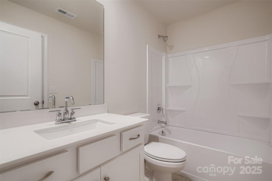 Furnished interior view inside a new home in Shannon Woods: Walk & Enclave, Maiden (Image 3).