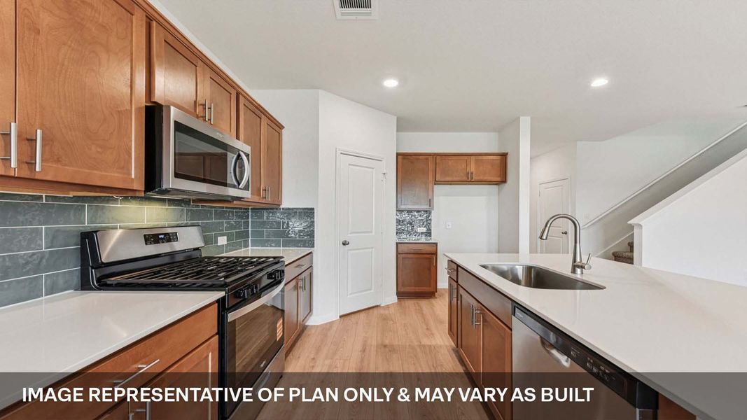 Representative furnished interior of a home built from the The Mitchell by D.R. Horton in Bar W Ranch, Leander (Image 6).