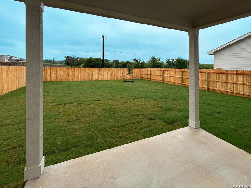 Exterior details and patio area of a home in Hennersby Hollow, San Antonio (Image 4).