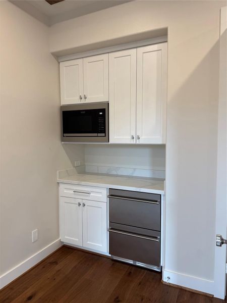 Media room popcorn bar...drink drawer refrigerator & microwave