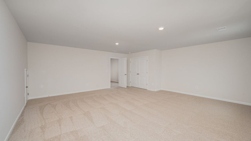 Spacious, unfurnished interior of a new home in Indigo Preserve, Leland (Image 21).