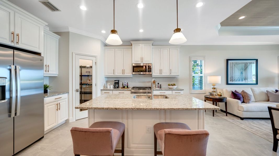 Representative furnished interior of a home built from the Dream 2 by Neal Communities in SkySail, Naples (Image 12).