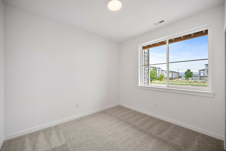 Spacious, unfurnished interior of a new home in The Commons at Victory Ridge, Colorado Springs (Image 25).