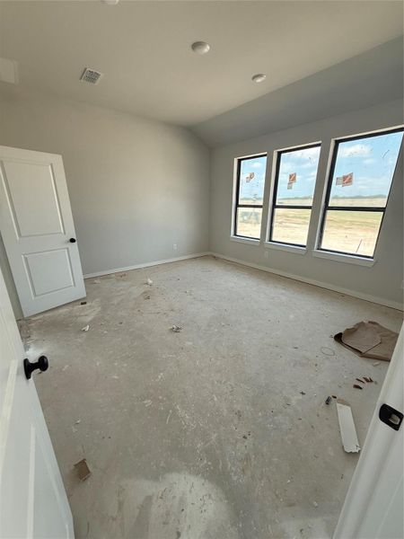 Main bedroom privately located towards the rear of the home.