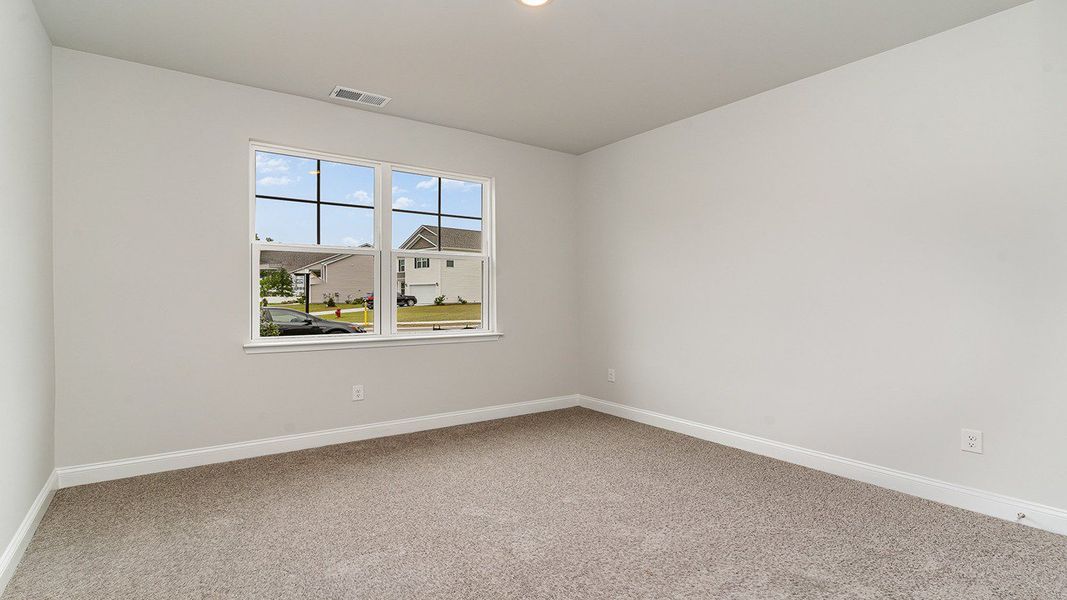 Spacious, unfurnished interior of a new home in The Preserve at Shaftesbury Glen, Conway (Image 13).