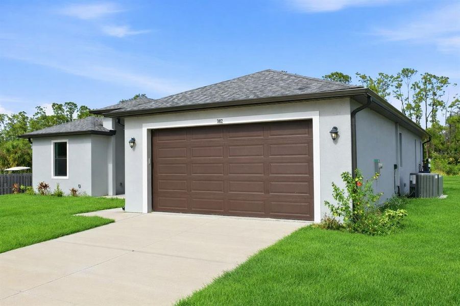 Front exterior of a new home in , North Port, FL, highlighting curb appeal (Image 19).