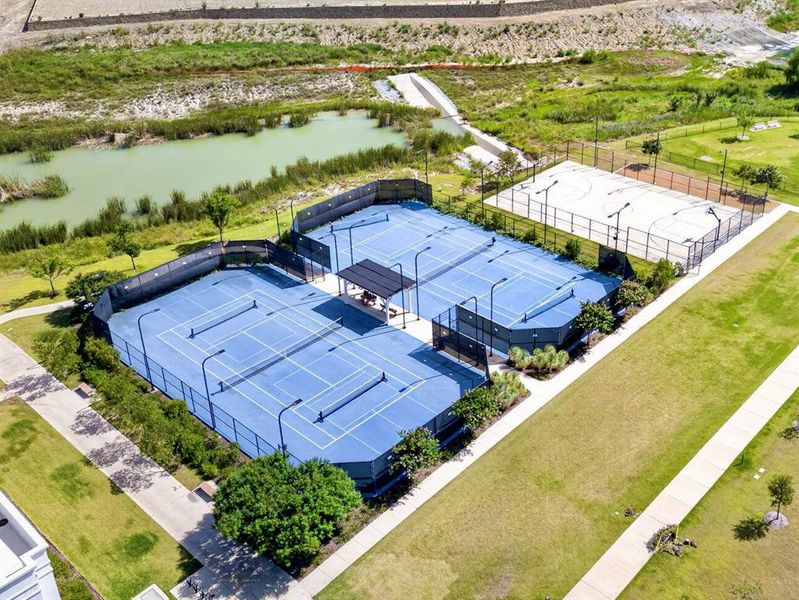 And for the sporty types...sports courts and an Athletic Club. All included. Right outside your door. And for the sporty types...sports courts and an Athletic Club. All included. Right outside your door.