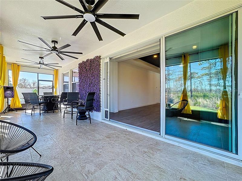 Exterior details and patio area of a home in Bridgewalk, St. Cloud (Image 4).