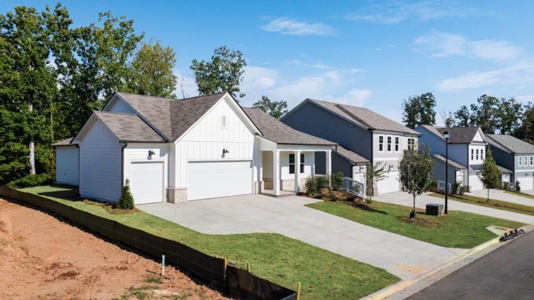 Front exterior of a new home in Falcon Landing, Gainesville, GA, highlighting curb appeal (Image 2).