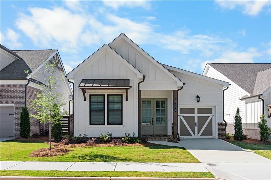 Front exterior of a new home in Aberdeen, Hoschton, GA, highlighting curb appeal (Image 27). Front exterior of a new home in Aberdeen, Hoschton, GA, highlighting curb appeal (Image 27).