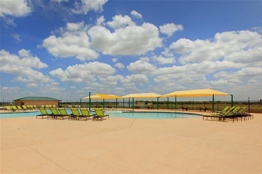 View of swimming pool with a patio area