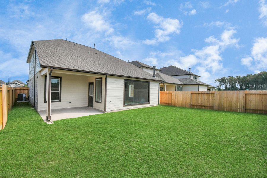 Explore the expansive backyard with its inviting covered patio—a perfect blend of space for the kids to play and adults to unwind. Ideal for creating your outdoor oasis, this backyard accommodates patio furniture, a BBQ pit, and endless possibilities for leisure and entertainment.