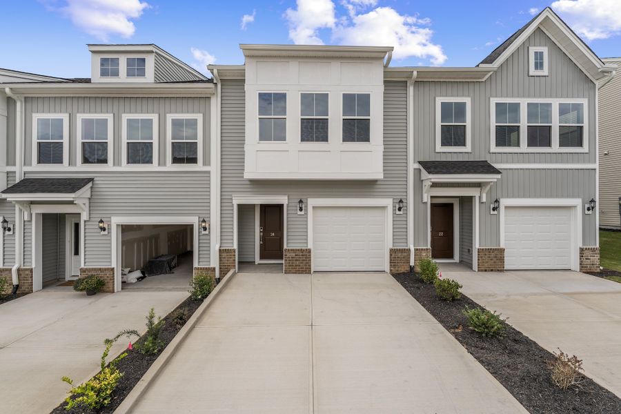 Front exterior of a new home in Edwards Station, Taylors, SC, highlighting curb appeal (Image 1).