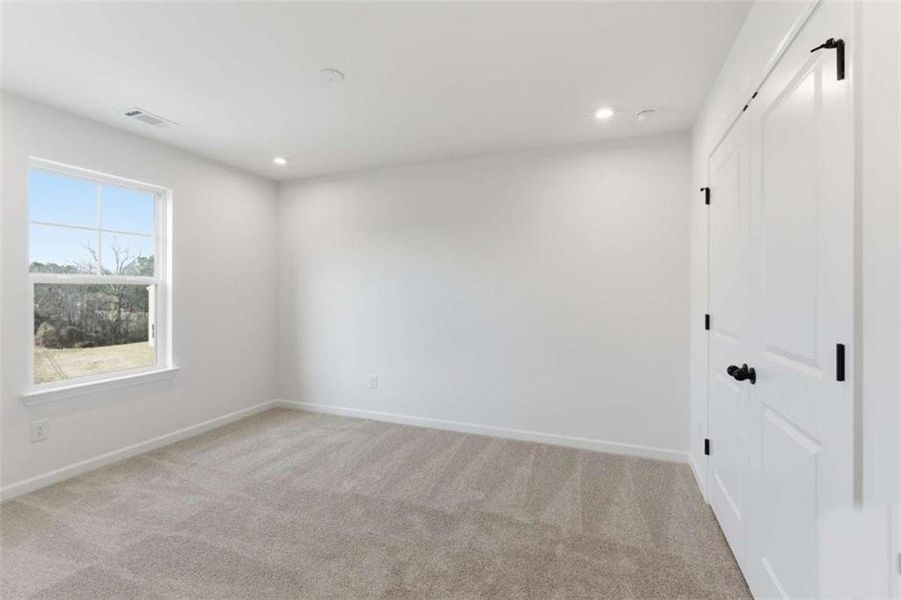 Spacious, unfurnished interior of a new home in The Reserve at Chapel Hill Phase II, Douglasville (Image 19).