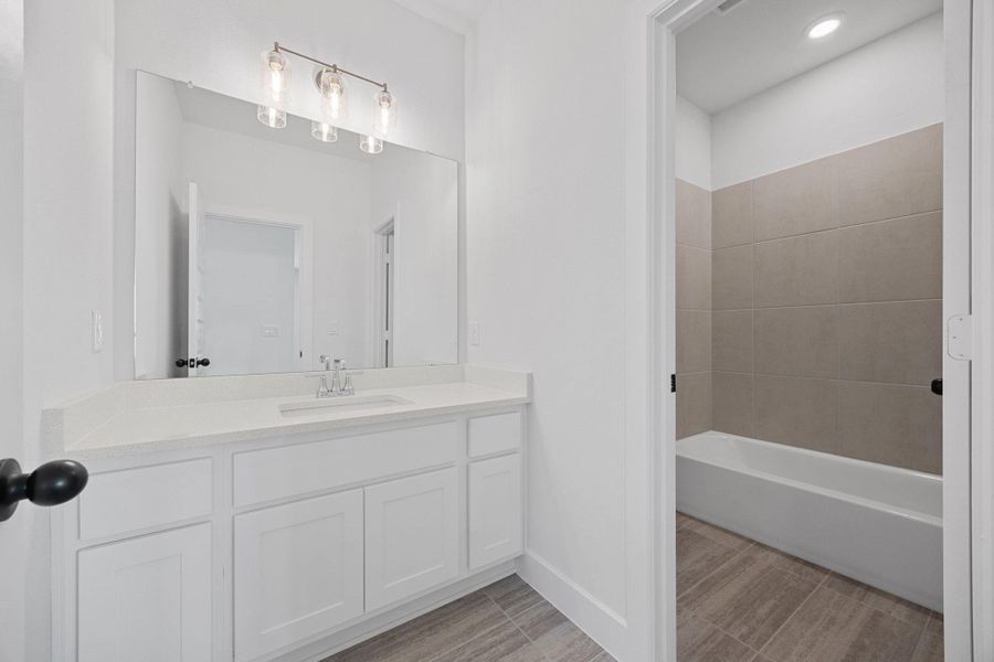 Furnished interior view inside a new home in Provence - 60', Austin (Image 12). Furnished interior view inside a new home in Provence - 60', Austin (Image 12).