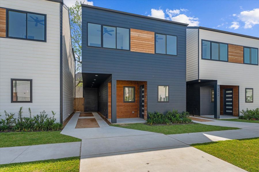 Front exterior of a new home in , Houston, TX, highlighting curb appeal (Image 28). Front exterior of a new home in , Houston, TX, highlighting curb appeal (Image 28).