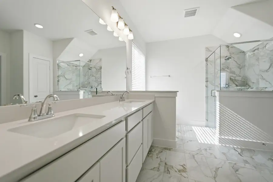 Furnished interior view inside a new home in Sunterra Lakes, Brookshire (Image 14).