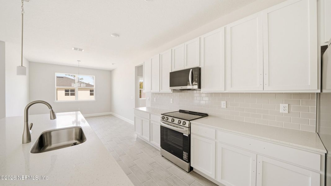 Furnished interior view inside a new home in , Palm Coast (Image 29).