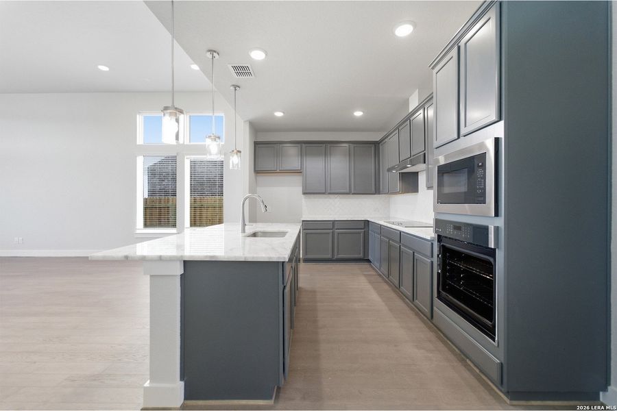 Furnished interior view inside a new home in The Woodlands at Medina Hills, Mico (Image 8).