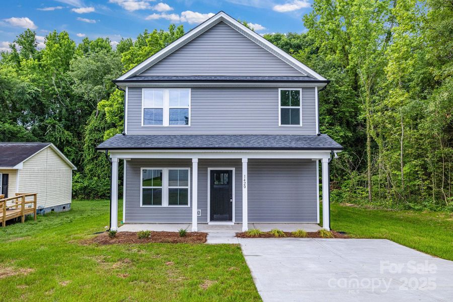 Front exterior of a new home in , Kannapolis, NC, highlighting curb appeal (Image 1).