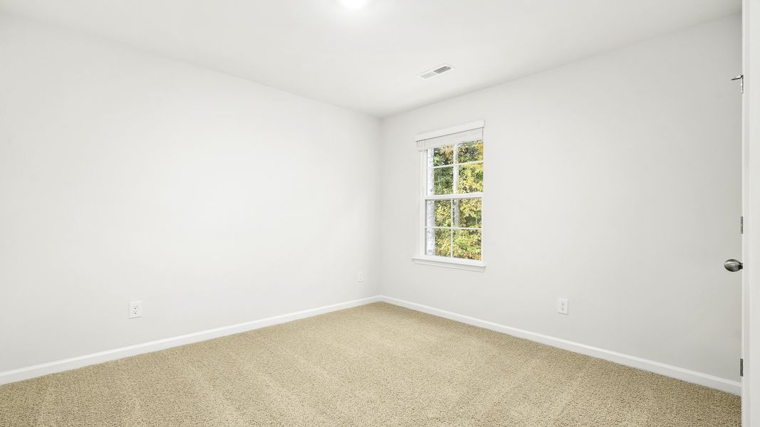 Spacious, unfurnished interior of a new home in Greystone North, Stoneville (Image 13).