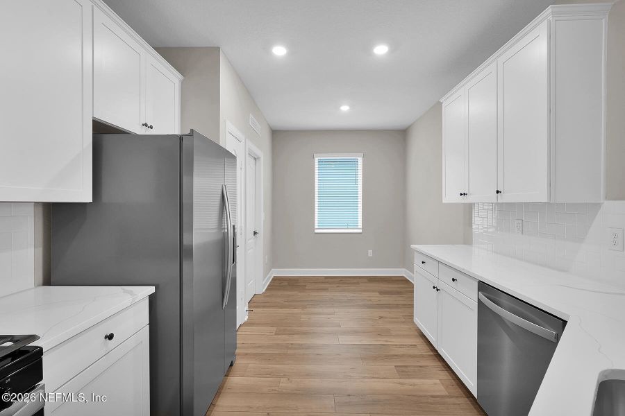 Furnished interior view inside a new home in , Jacksonville (Image 6).