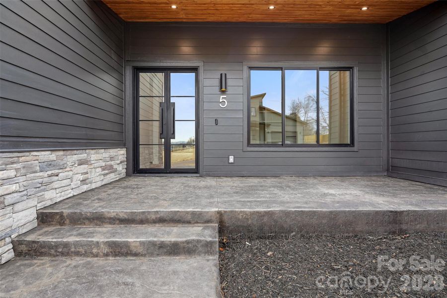 Exterior details and patio area of a home in , Asheville (Image 32).