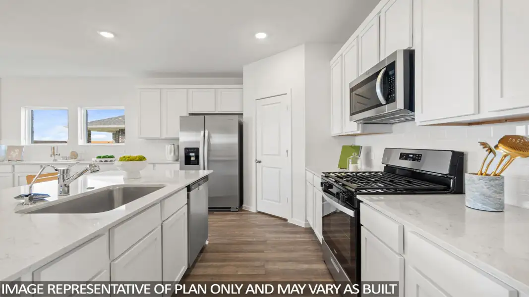 Furnished interior view inside a new home in Sunterra Lakes, Brookshire (Image 9).