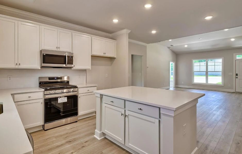 Furnished interior in a model home at Satchel Ford in Columbia (Image 5).