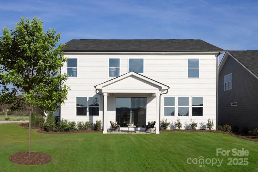 Model home in another community. For representation only. Exterior and interior colors and finishes will vary.