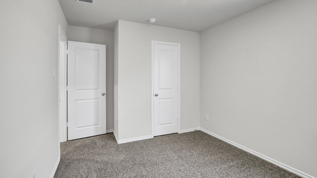 Spacious, unfurnished interior of a new home in Stonewyck Farms, Ennis (Image 14).
