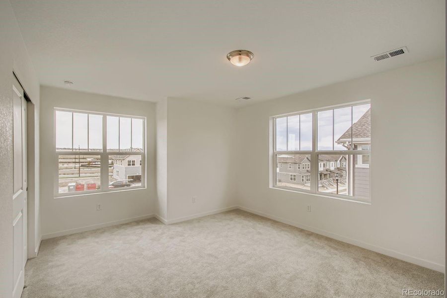 Spacious, unfurnished interior of a new home in Parterre: The Skyline Collection, Thornton (Image 11).