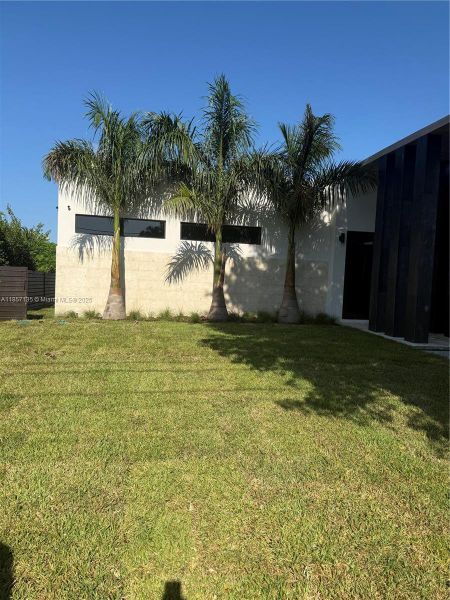 Front exterior of a new home in , Miami, FL, highlighting curb appeal (Image 19). Front exterior of a new home in , Miami, FL, highlighting curb appeal (Image 19).