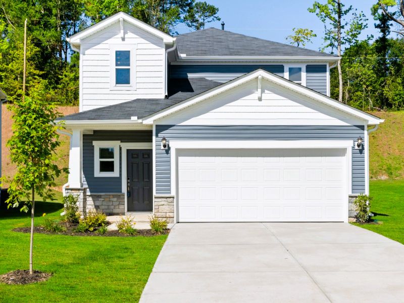 Front exterior of a new home in Creek Ridge - Heritage Collection, Spartanburg, SC, highlighting curb appeal (Image 1).