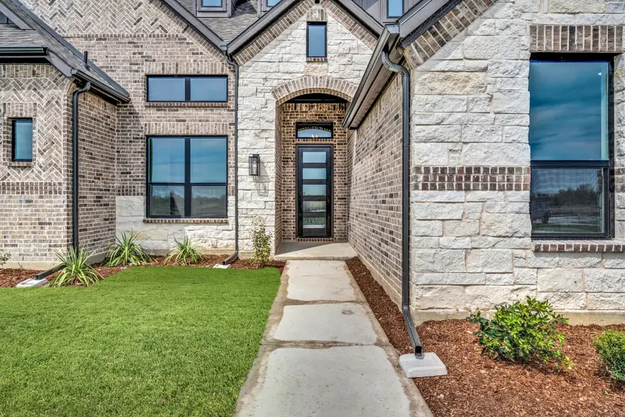 Exterior details and patio area of a home in Legacy Trails, McLendon-Chisholm (Image 3).