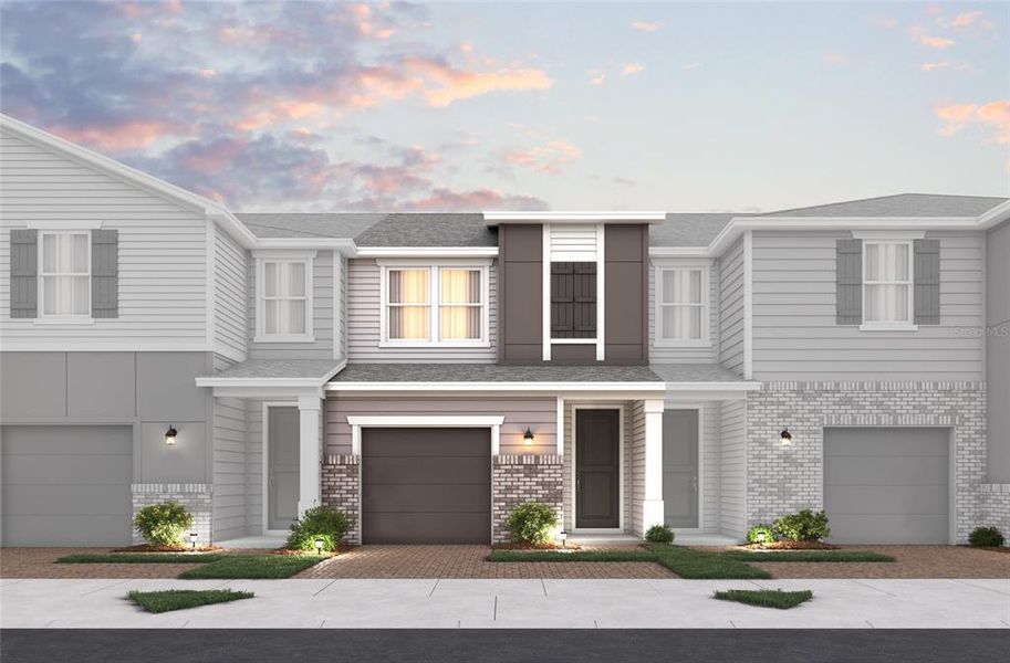 Front exterior of a new home in Towns at Riverwalk: Lake Monroe TH, Sanford, FL, highlighting curb appeal (Image 1). Front exterior of a new home in Towns at Riverwalk: Lake Monroe TH, Sanford, FL, highlighting curb appeal (Image 1).
